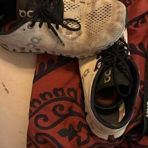 On Running Gray and Black Athletic Shoes